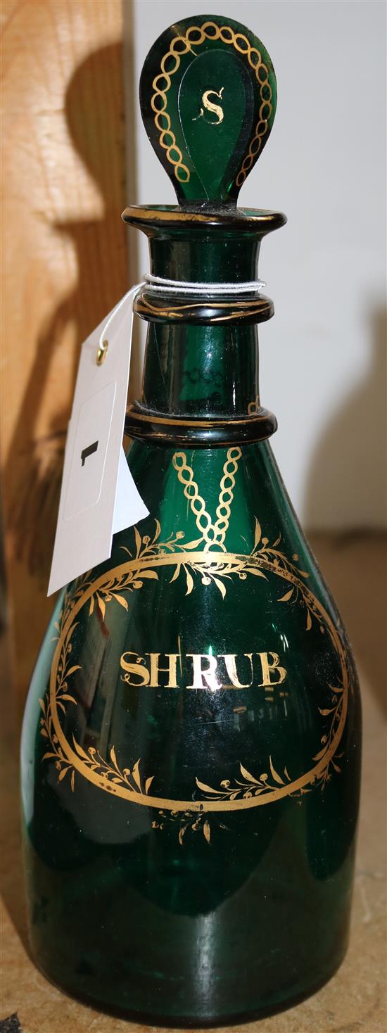 Late Georgian dark green glass decanter, gilt inscribed shrub